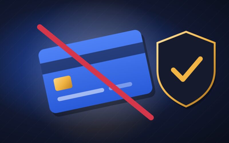 Illustration of a blue credit card crossed out by a red line beside a gold-edged security shield